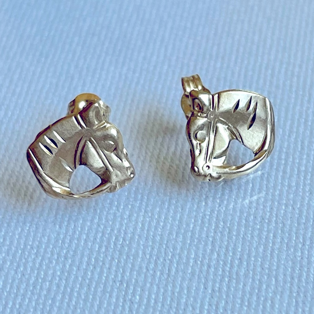Gold horse head earrings